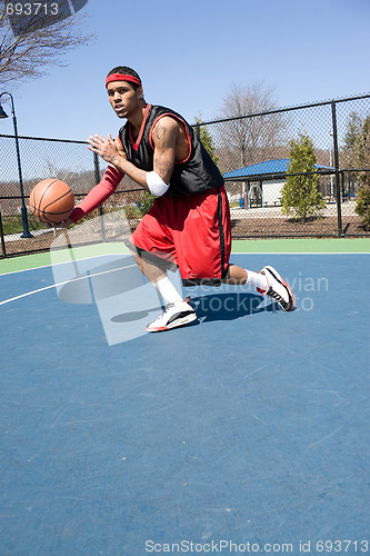 Image of Basketball Player Dribbling