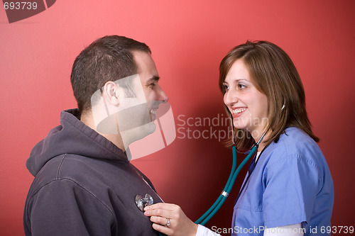 Image of Checking His Heartbeat