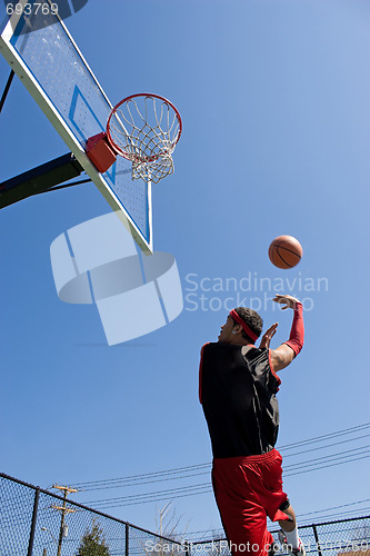 Image of Man Playing Basketball