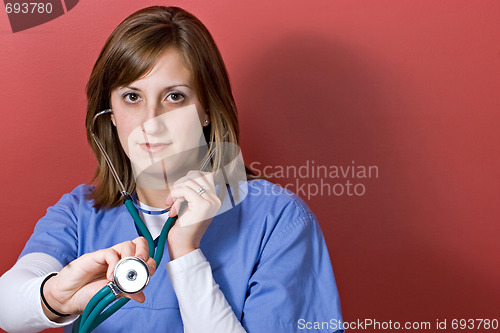 Image of Nurse Using a Stethoscope