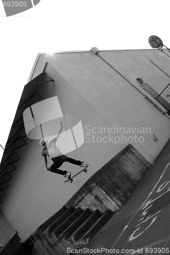 Image of Skateboarder Airborne