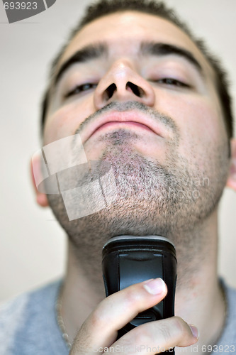 Image of Man Shaving