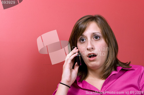 Image of Surprised Woman on the Phone