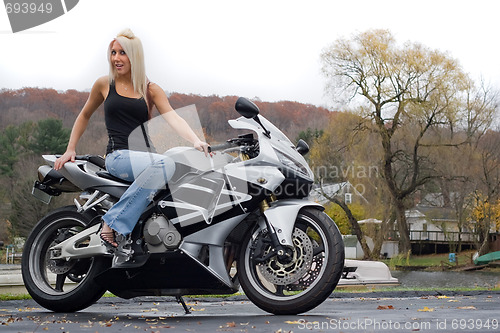 Image of Blonde Woman On a Motorcycle