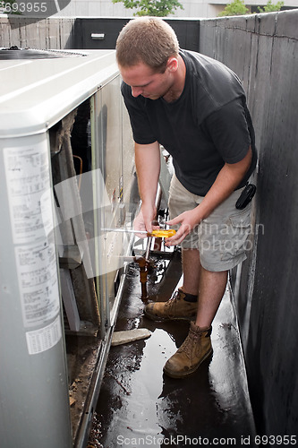 Image of HVAC Technician Working