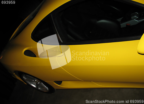 Image of yellow sports car