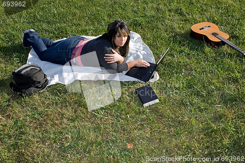 Image of Woman Using a Laptop