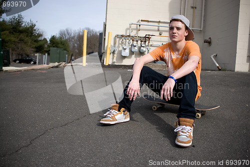 Image of Skateboarder Resting