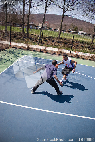 Image of Guys Playing Basketball