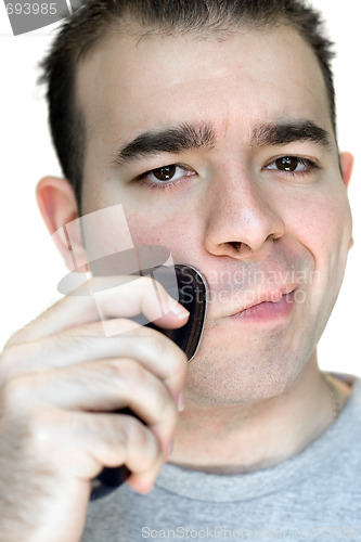 Image of Young Man Shaving