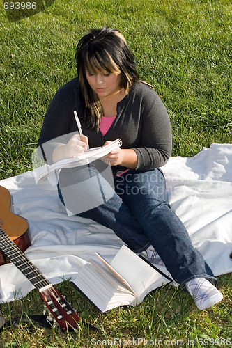 Image of Musician Writing a Song