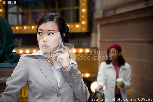 Image of Business Woman On Her Phone