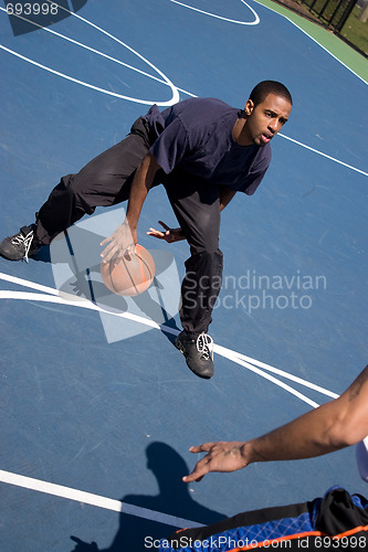 Image of Guys Playing Basketball