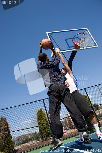 Image of Man Playing Basketball