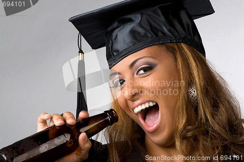 Image of Happy Graduate Drinking