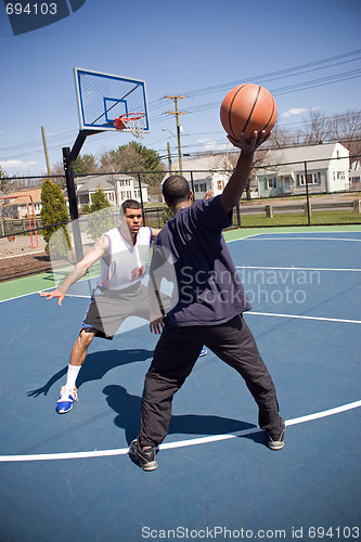 Image of Man Playing Basketball