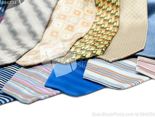 Image of Male ties over white background