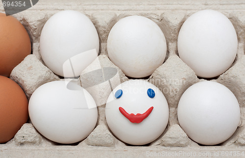 Image of Egg in packing, smile