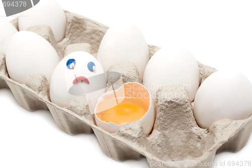 Image of Egg looks at broken person