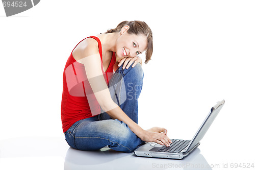 Image of Young woman using a laptop