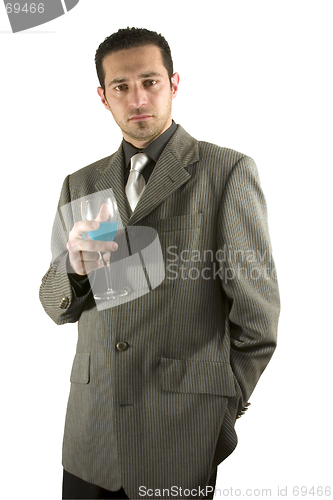 Image of Businessman celebrating with a glass of drink