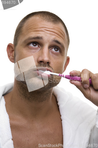 Image of Man Brushing his Teeth