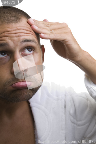 Image of Man and his balding head