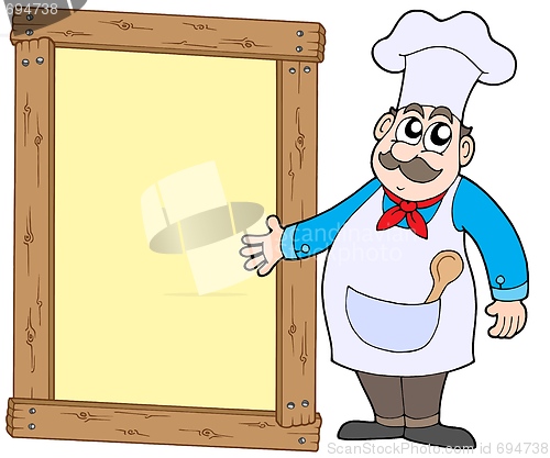 Image of Chef with wooden panel