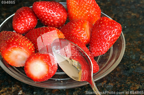 Image of Red strawberry in the glass plate