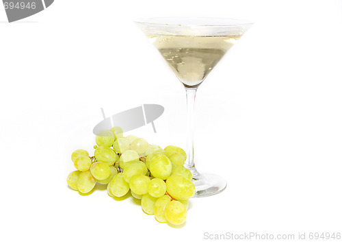 Image of Very sweet white wine in the martini glasses isolated on white 