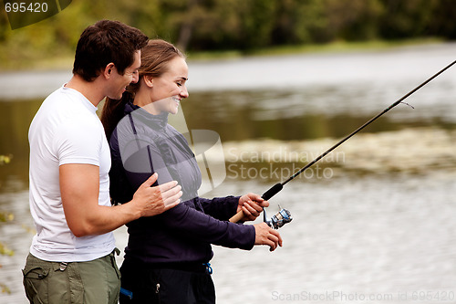 Image of Happy Fishing Woman