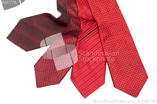 Image of Four male ties, red and crimson