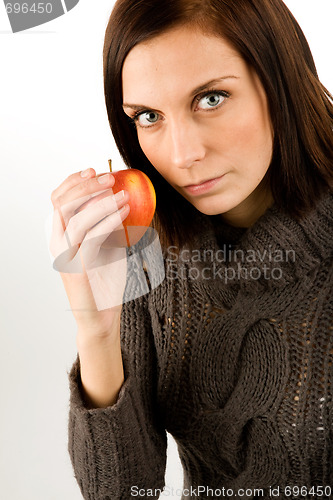 Image of Woman eating Apple