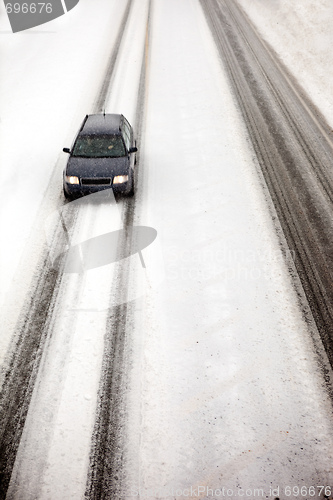 Image of Car in Snow Storm