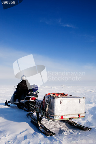 Image of Man with Snowmobile