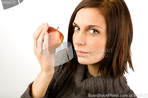 Image of Woman eating Apple