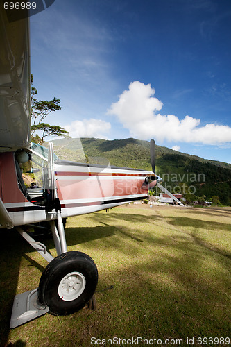 Image of Airplane on Mountain Runway