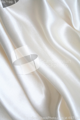 Image of Smooth elegant white silk as background 