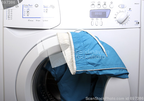 Image of Trousers and laundry.
