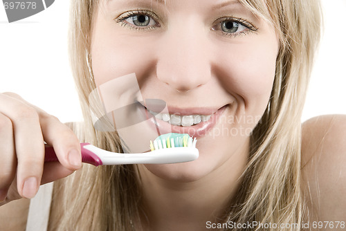 Image of woman tooth brush