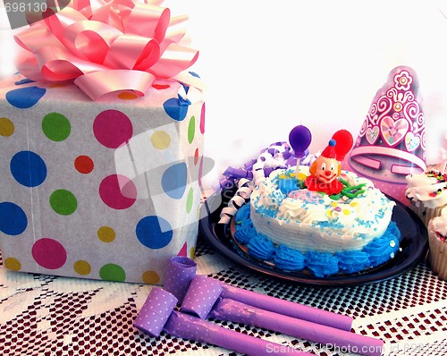 Image of Birthday cake with party favors