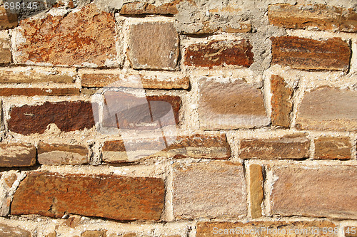 Image of Abstract old colorful stone wall as background 