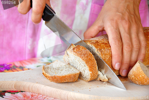 Image of Cutting bread