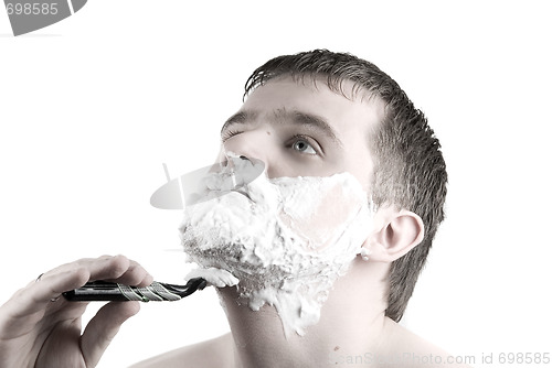 Image of Shaving  Man with razor and foam