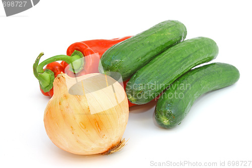 Image of Tasty kitchen. Fresh vegetables isolated on white