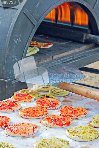 Image of Preparing a tasty pizza in the oven