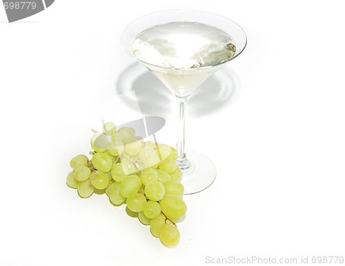 Image of Very sweet white wine in the martini glasses isolated on white 