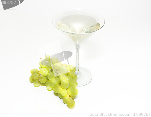 Image of Very sweet white wine in the martini glasses isolated on white 