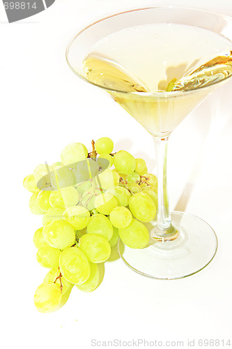 Image of Very sweet white wine in the martini glasses isolated on white 