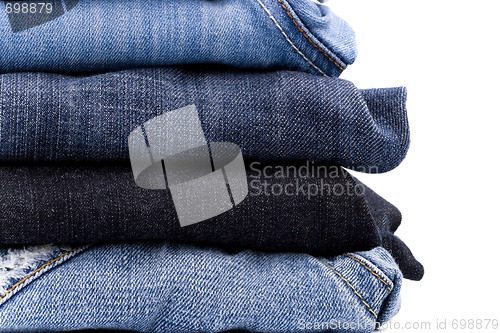 Image of stack of blue jeans